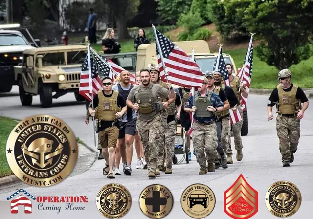 Veterans in gear marching with American flags, with US Veterans Corps and Operation: Coming Home emblems